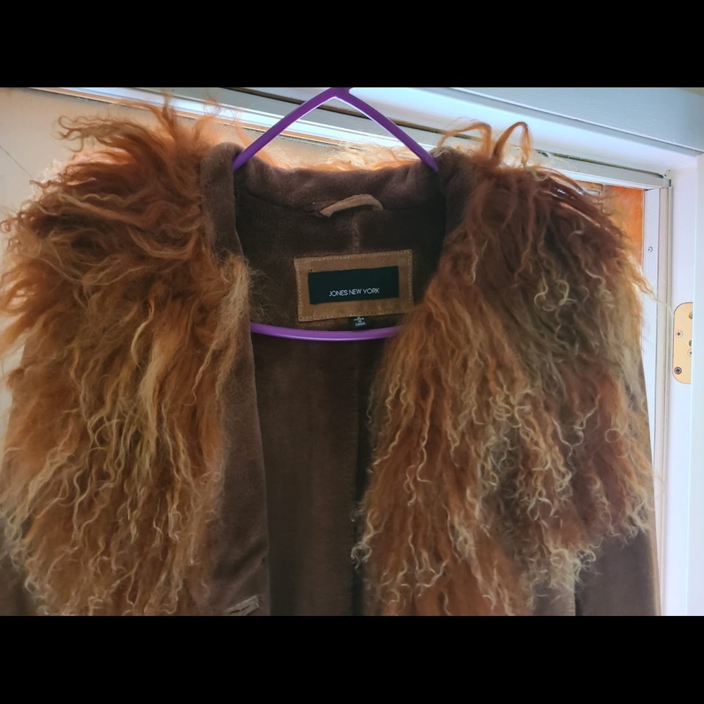 Pre-owned suede coat with feathers.